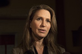 Caroline Mulroney speaks to reporters following an early morning PC Caucus meeting in Toronto on November 29, 2018.