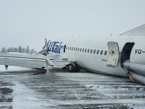 A view shows the UTair Airlines Boeing 737 passenger plane following a hard landing at Usinsk airport, Komi Republic, Russia February 9, 2020. (Russian Emergencies Ministry/Handout via REUTERS)