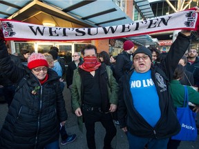 Protesters on behalf of Wet'suwet'en blockade nation block Commercial and Broadway in Vancouver, Feb. 19, 2020. (Arlen Redekop / PNG staff photo)