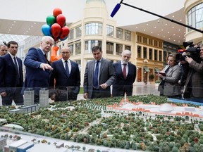Officials, including Russian President Vladimir Putin and Mayor of Moscow Sergei Sobyanin, visit the Dream Island amusement park ahead of its upcoming inauguration in Moscow, Russia February 27, 2020.
