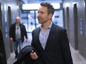 Former radio and television personality Eric Salvail arrives at the courthouse in Montreal on Wednesday, Feb. 19, 2020.
