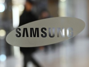 The logo of Samsung Electronics is seen on a glass door at a company showroom in Seoul on Jan. 30, 2020.