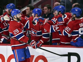 Marco Scandella of the Montreal Canadiens celebrates his goal with teammates on the bench during a game against the Toronto Maple Leafs at the Bell Centre on February 8, 2020 in Montreal. (Minas Panagiotakis/Getty Images)