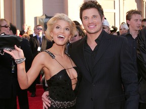 In this Nov. 14, 2004, file photo, Jessica Simpson and Nick Lachey arrive at the 32nd Annual "American Music Awards" at the Shrine Auditorium in Los Angeles.