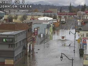 Localized flooding has caused the closure of the Sumas border crossing. This traffic camera from the Washington State Department of Transportation shows flooding of Johnson Creek affecting SR 9 just south of the crossing.