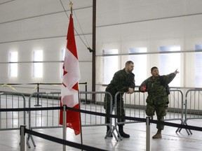 An examination area is set up where passengers from the Wuhan evacuation flight to Canada will be processed before heading to their quarantined rooms in Trenton, Ont., on Thursday, Feb. 6, 2020.