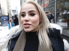 Marcella Zoia, 19, is pictured while leaving Toronto's College Park courts on Feb. 13, 2019. (Jack Boland, Toronto Sun)