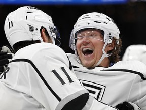 Los Angeles Kings right wing Tyler Toffoli celebrates with Anze Kopitar after Kopitar scored the winning goal over the Boston Bruins at TD Garden. (Winslow Townson-USA TODAY Sports)