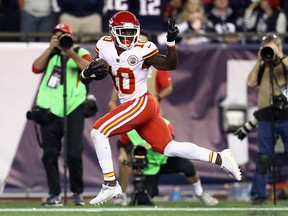 Tyreek Hill of the Kansas City Chiefs celebrates on his way to scoring a touchdown against the New England Patriots at Gillette Stadium on September 7, 2017 in Foxboro. (Maddie Meyer/Getty Images)