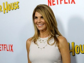 Cast member Lori Loughlin poses at the premiere for the Netflix television series "Fuller House" at The Grove in Los Angeles, California, U.S., February 16, 2016.