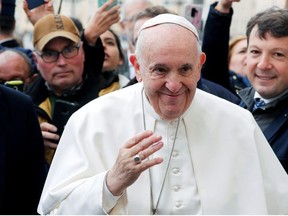 Pope Francis greets faithful during the weekly general audience at the Vatican on February 26, 2020.