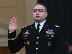 In this file photo taken on November 19, 2019 National Security Council Ukraine expert Lieutenant Colonel Alexander Vindman takes the oath before testifying before the House Intelligence Committee, on Capitol Hill in Washington. (ANDREW CABALLERO-REYNOLDS/AFP via Getty Images)