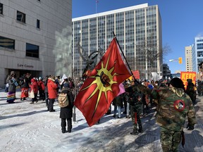 Marchers hold demonstration at the Manitoba Law Courts during a march in solidarity with the Wet'suwet'en Hereditary Chiefs in Winnipeg on Tuesday, Feb. 18, 2020. (GLEN DAWKINS/Winnipeg Sun/Postmedia Network)