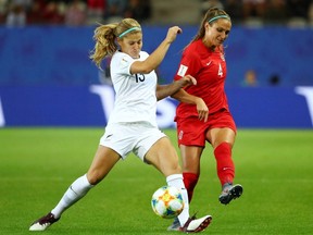 Canada's Shelina Zadorsky, right, in action with New Zealand's Rosie White at the 2019 FIFA Women's World Cup, scored in a 2-0 win against Mexico at the CONCACAF Olympic qualifying tournament in Edinburg, Texas on Tuesday, Feb. 4, 2020.