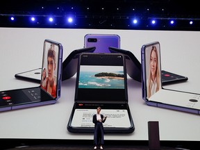 Rebecca Hirst, head of U.K. product marketing of Samsung Electronics, unveils the Z Flip foldable smartphone during Samsung Galaxy Unpacked 2020 in San Francisco,  Feb. 11, 2020.