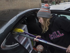 McGill University student and Michigan resident Caitlin Mazurek packs her car Tuesday, March 24, to drive home to Michigan. McGill students, Mazurek being one of them, were given 48 hours to vacate a residence run by the Jeanne Sauvé Foundation.