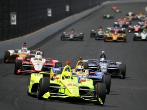 Simon Pagenaud of France, driver of the Menards Team Penske Chevrolet leads a pack of cars during  the 103rd running of the Indianapolis 500 at Indianapolis Motor Speedway on May 26, 2019 in Indianapolis, Indiana.