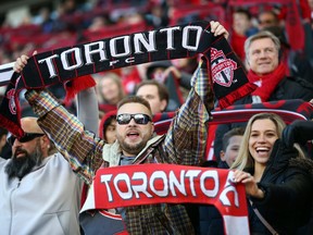 Fans sing the national anthem prior to the first half of an MLS game between New York City FC and Toronto FC at BMO Field on March 7, 2020 in Toronto. (Photo by Vaughn Ridley/Getty Images)