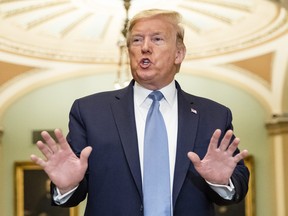 U.S. President Donald Trump talks to reporters at the Capitol after attending the Senate Republicans weekly policy luncheon on March 10, 2020 in Washington, DC.