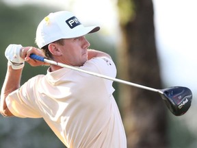 MacKenzie Hughes of Canada watches his tee shot on the 18th hole during the final round of the Honda Classic at PGA National Resort and Spa Champion course on March 1, 2020 in Palm Beach Gardens, Florida.