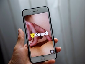 Grindr app is seen on a mobile phone in this photo illustration taken in Shanghai, China March 28, 2019. REUTERS/Aly Song/File Photo