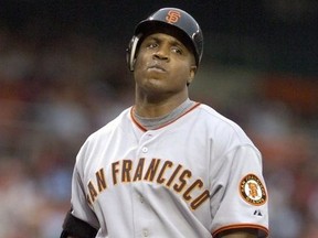 San Francisco Giants slugger Barry Bonds reacts to a strike call against the Washington Nationals in the first inning of their National League Baseball game in Washington July 25, 2006.