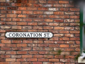 The famous Coronation St soap opera street sign hangs on the wall of the Rovers Return on November 21, 2014 in Manchester, England.