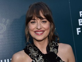 US actress Dakota Johnson arrives for the LA special screening of "The Peanut Butter Falcon" at the Arclight theatre in Hollywood on August 1, 2019.