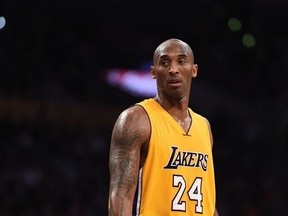 In this file photo taken on November 21, 2015 Kobe Bryant (24) of the Los Angeles Lakers looks on during the Lakers NBA match up with the Toronto Raptors, at Staples Center in Los Angeles, California.