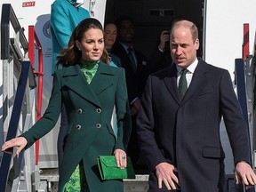 Britain's Prince William, Duke of Cambridge (R), and Catherine, Duchess of Cambridge (L), disembark as they arrive at Dublin International Airport in Dublin on March 3, 2020 at the start of a three-day visit.