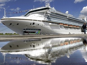 In this file photo One of the biggest world cruise liners in the world, P&O's "Grand Princess" stays on dock in St. Petersburg port, May 24, 2004. (STRINGER/INTERPRESS/AFP via Getty Images)