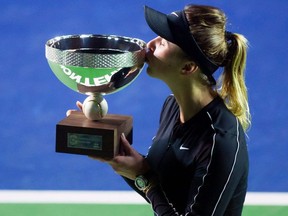 Ukraine's tennis player Elina Svitolina kisses the trophy after winning the Monterrey WTA Open women's final singles tennis match against Czech Republic's Marie Bouzkova, in Monterrey, Nuevo Leon State, Mexico on March 8, 2020. (
