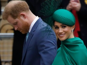 Britain's Prince Harry, Duke of Sussex, (L) and Meghan, Duchess of Sussex arrive to attend the annual Commonwealth Service at Westminster Abbey in London on March 09, 2020.