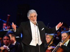 In this file photo taken on August 28, 2019 Spanish tenor Placido Domingo performs during his concert in the newly inaugurated sports and culture centre 'St Gellert Forum' in Szeged, southern Hungary.