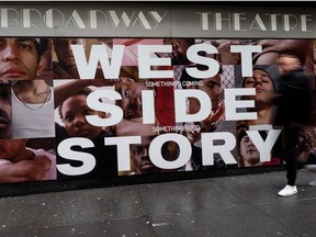 In this file photo a poster is seen outside the Broadway Theater adverting West Side Story on February 7, 2020 in New York City.
