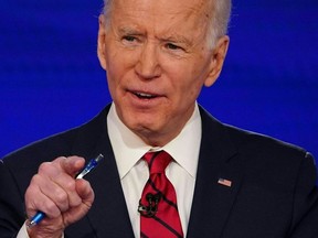 In this file photo Democratic presidential hopeful former US vice president Joe Biden makes a point as he and Senator Bernie Sanders take part in the 11th Democratic Party 2020 presidential debate in a CNN Washington Bureau studio in Washington, DC on March 15, 2020.