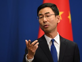 Chinese Foreign Ministry spokesman Geng Shuang speaks during the daily press briefing in Beijing on March 18, 2020. (GREG BAKER/AFP via Getty Images)