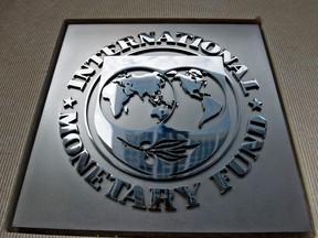 In this file photo taken on June 30, 2015 a logo is seen outside the headquarters of the International Monetary Fund in Washington, DC.