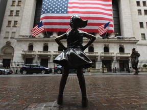 In this file photo The Fearless Girl statue stands in front of the New York Stock Exchange near Wall Street on March 23, 2020 in New York City. (ANGELA WEISS/AFP via Getty Images)