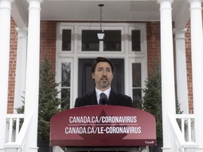 Prime Minister Justin Trudeau speaks to the media about the COVID-19 pandemic during a news conference outside Rideau cottage in Ottawa, Friday, March 20, 2020.