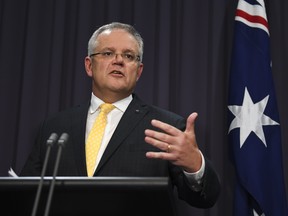 Australian Prime Minister Scott Morrison addresses the media during a press conference on March 24, 2020 in Canberra.  (Lukas Coch - Pool/Getty Images)
