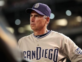 Manager Bud Black of the San Diego Padres watches from the dugout on August 7, 2010 in Phoenix.