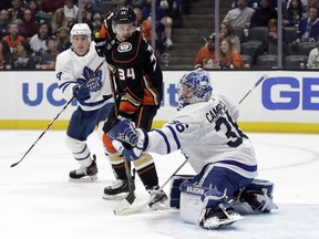 Maple Leafs goaltender Jack Campbell stops the Ducks' Sam Steel on Friday night in, Anaheim, Calif. Campbell continues to provide solid back-up goaltending for Toronto. (Marcio Jose Sanchez/The Associated Press)