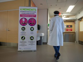 A sign for washing hands is seen during a media tour of quarantine facilities for treating novel coronavirus at Jewish General Hospital in Montreal March 2, 2020. (REUTERS/Christinne Muschi/File Photo)