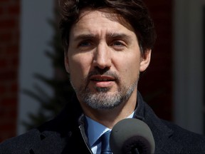 Canada's Prime Minister Justin Trudeau speaks to news media outside his home in Ottawa, Ontario, Canada March 16, 2020.