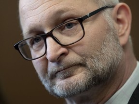 Minister of Justice and Attorney General of Canada David Lametti speaks with the media following party caucus in Ottawa, Tuesday, January 28, 2020.