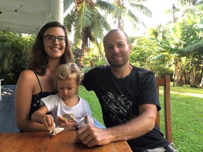 Emmanuel Samoglou, his wife, Nicole Adoranti and their two-year-old daughter pose in this undated handout photo.