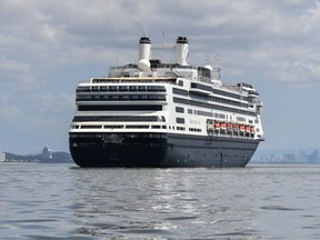 The Rotterdam cruise ship waits berthed to assist the Zaandam cruise ship with supplies, personnel and COVID-19 testing devices, off Panama City, on March 27, 2020. (LUIS ACOSTA/AFP via Getty Images)