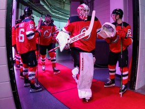 Devils goaltender Mackenzie Blackwood walks to the ice before the first period of their game against the Penguins at Prudential Center in Newark, N.J., on March 10, 2020.