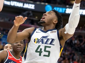 Jazz guard Donovan Mitchell shoots the ball in a game against the Wizards during first half NBA action at Vivint Smart Home Arena in Salt Lake City, on Feb. 28, 2020.